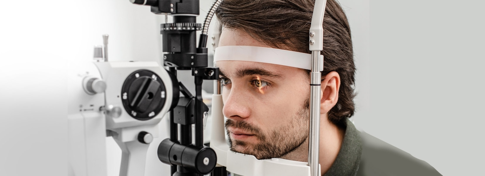 young man during eye exam in North Central
